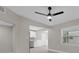 View of the living room leading to kitchen with stainless appliances at 900 Citrus St, Orlando, FL 32805