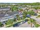Aerial view of the home showcasing its well-manicured front yard and neighborhood at 9189 Camden Gardens St, Orlando, FL 32827