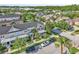 Overhead view of the home in a lushly landscaped neighborhood at 9189 Camden Gardens St, Orlando, FL 32827