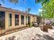 Spacious backyard patio featuring outdoor seating with a brick surface and ample sunshine at 103 Red Cedar Dr, Longwood, FL 32779