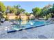 Inviting community pool with ample lounge seating and well-maintained grounds at 103 Red Cedar Dr, Longwood, FL 32779