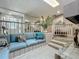 Living room with unique step down seating area with built in seating and pillows at 103 Red Cedar Dr, Longwood, FL 32779