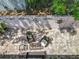 Aerial view of patio with brick pavers, outdoor seating, and decorated wall creating a private space at 103 Red Cedar Dr, Longwood, FL 32779