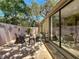 Inviting patio offers a relaxing seating area with brick pavers and access to the home's interior at 103 Red Cedar Dr, Longwood, FL 32779