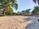 Exterior shot of a playground featuring swings and sand at 103 Red Cedar Dr, Longwood, FL 32779