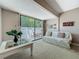 Sun room features a sliding glass door to the outside and neutral carpeting at 103 Red Cedar Dr, Longwood, FL 32779
