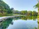 Water feature with stone wall and green grass in background at 103 Red Cedar Dr, Longwood, FL 32779
