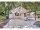 A lovely single-story home featuring a covered parking area with shade and a manicured walkway at 1032 Perkins Rd, Orlando, FL 32809