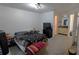 Cozy main bedroom with carpet flooring, a large bed, and an ensuite bathroom at 1038 Waterside Dr, Celebration, FL 34747
