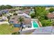 Aerial view of the home showcasing the pool, patio, and backyard at 11836 Hartfordshire Way, Orlando, FL 32824