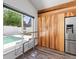 This eat-in kitchen with modern finishes features a breakfast bar overlooking the pool area at 11836 Hartfordshire Way, Orlando, FL 32824
