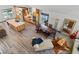 Open-concept living space with lots of natural light, stylish décor and modern finishes at 11836 Hartfordshire Way, Orlando, FL 32824