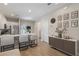 Bright and open kitchen featuring stainless steel appliances and modern bar seating at 146 E 15Th St, Apopka, FL 32703