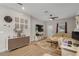 Inviting living room with stylish decor, media center, and comfortable seating area at 146 E 15Th St, Apopka, FL 32703