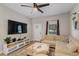 Cozy living room with comfortable seating, media center, and natural light at 146 E 15Th St, Apopka, FL 32703