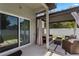 Covered patio with stylish furniture and an indoor/outdoor flow great for relaxing and entertaining at 146 E 15Th St, Apopka, FL 32703
