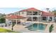 Large backyard features a beautiful pool, outdoor kitchen, covered seating area and plenty of room for entertaining at 14724 Avenue Of The Rushes, Winter Garden, FL 34787