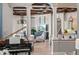 Open-concept living area with a piano, TV, and stylish decor at 14724 Avenue Of The Rushes, Winter Garden, FL 34787