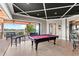 Recreation room with a pool table and access to an outdoor terrace at 14724 Avenue Of The Rushes, Winter Garden, FL 34787