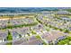 A Primary-planned community with closely spaced homes, green spaces, and roadways at 15030 Book Club Rd, Winter Garden, FL 34787