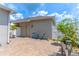 Paver patio with outdoor seating and white fence creating a private backyard space at 15030 Book Club Rd, Winter Garden, FL 34787