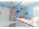 Bright bathroom featuring a shower/tub combination and a large white vanity with quartz countertop at 15030 Book Club Rd, Winter Garden, FL 34787