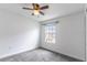 Cozy bedroom features carpet and a window with lovely natural light at 15030 Book Club Rd, Winter Garden, FL 34787