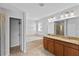 Bathroom featuring double vanity, soaking tub, and glass shower at 1902 Hailsham Ct, Orlando, FL 32824