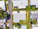 Aerial view of property highlighting the boundaries and surrounding landscaping at 200 Palm Meadows Dr, Eustis, FL 32726