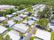An aerial view of a mobile home community in a wooded area at 200 Palm Meadows Dr, Eustis, FL 32726