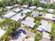 Aerial view of the property showcasing the home, lot, and landscaping at 200 Palm Meadows Dr, Eustis, FL 32726