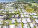 Aerial view of the mobile home community near a lake at 200 Palm Meadows Dr, Eustis, FL 32726