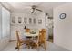 Dining area featuring a round table with wood chairs, built-in cabinets, and an abundance of natural light at 200 Palm Meadows Dr, Eustis, FL 32726