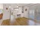 Bright living area with wood floors and plenty of natural light at 200 Palm Meadows Dr, Eustis, FL 32726