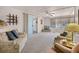 Spacious living area featuring sliding glass door access to another room at 200 Palm Meadows Dr, Eustis, FL 32726