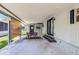 Spacious covered patio offers ample room for outdoor enjoyment at 200 Palm Meadows Dr, Eustis, FL 32726