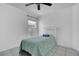 Bedroom featuring tile floors, ceiling fan, and window at 204 Bay Meadow Dr, Kissimmee, FL 34746