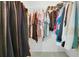 Walk-in closet filled with lots of clothes at 204 Bay Meadow Dr, Kissimmee, FL 34746