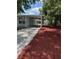 Long driveway leading to the home, complemented by modern landscaping at 205 Brighton Way, Casselberry, FL 32707