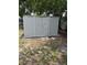 Outdoor backyard shed for extra storage, providing practical utility at 205 Brighton Way, Casselberry, FL 32707