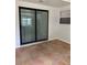 Sunroom with tile floor and sliding glass doors leading to the outside at 205 Brighton Way, Casselberry, FL 32707