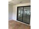 Sunroom with sliding glass doors that have vertical blinds and tile floor at 205 Brighton Way, Casselberry, FL 32707