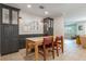 Dining area adjacent to kitchen featuring tile floors and ample storage at 2106 Tuscarora Trl, Maitland, FL 32751