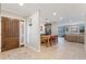 Elegant foyer with tiled floors, wooden door and dining area at 2106 Tuscarora Trl, Maitland, FL 32751