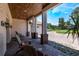 Inviting outdoor space with chairs, stone accents, and beautiful views at 2106 Tuscarora Trl, Maitland, FL 32751