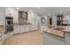 Well-equipped kitchen featuring stainless steel appliances, stone countertops, and modern white cabinetry at 2106 Tuscarora Trl, Maitland, FL 32751