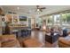 Sunroom features a wet bar, seating, and plenty of windows at 2106 Tuscarora Trl, Maitland, FL 32751
