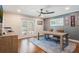 Home office with hardwood floors, ceiling fan, and french doors to the patio at 2106 Tuscarora Trl, Maitland, FL 32751
