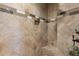 Close up on a tile shower with decorative border and a built-in niche at 2106 Tuscarora Trl, Maitland, FL 32751