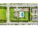 Aerial shot showcasing a community pool, clubhouse, playground, and lush landscaping, promoting an active lifestyle at 2125 Shackley Pl, Apopka, FL 32703